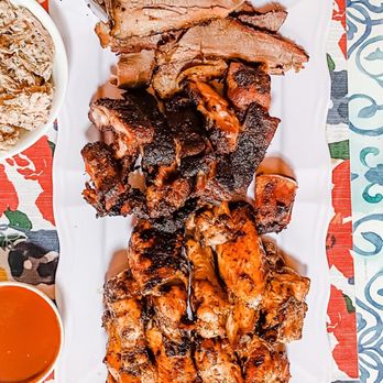 Sweets & Meats BBQ - Top to bottom: cornbread, brisket, pulled chicken, Pork Rib Tips, chicken wings, bbq sauce, and green beans. - Food Trucks Near Me - Cincinnati, Ohio Sweets & Meats BBQ - Top to bottom: cornbread, brisket, pulled chicken, Pork Rib Tips, chicken wings, bbq sauce, and green beans. - Food Trucks Near Me - Cincinnati, Ohio