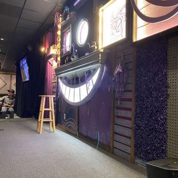 Mic Drop Comedy - front stage is alice in wonderland themed - Comedy Clubs Near Me - San Diego, California Mic Drop Comedy - front stage is alice in wonderland themed - Comedy Clubs Near Me - San Diego, California