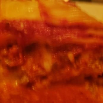 Caterina's - a slice of lasagna on a plate - Italian Near Me - Milwaukee, Wisconsin
