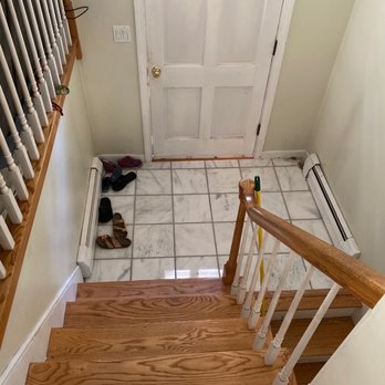 All ANGLES* Tile & Bath -  a view of a tiled floor and stairs - Tiling Near Me