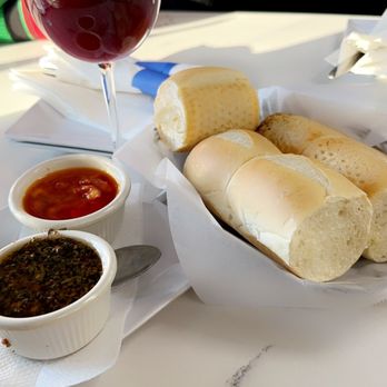 Mercado Buenos Aires - Chimichurri and dinner rolls. Sangria in the background. - Argentine Near Me - Van Nuys, California