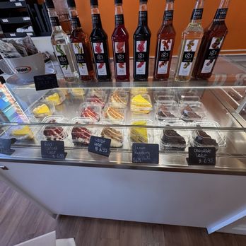 DOLCE & AMARO ARTISAN BAKERY - Cake slice dessert case - Bakeries Near Me - Greensboro, North Carolina DOLCE & AMARO ARTISAN BAKERY - Cake slice dessert case - Bakeries Near Me - Greensboro, North Carolina