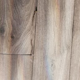 a closeup of a wood floor a closeup of a wood floor
