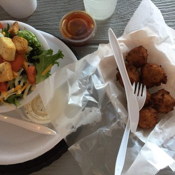 StingRay's Seafood - Conch fritters on right - the side salad was also delish and fresh and the croutons tasted homemade. - Seafood Near Me - Tybee Island, Georgia