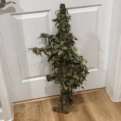 My newest paintball sniper rifle in my home made ghillie wrap that matches my homemade ghillie suit before loading it in the truck