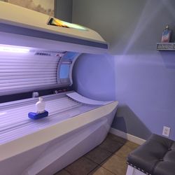 Glow & Wellness - Intermediate lay down tanning bed