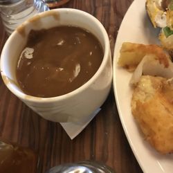 Gravy cup presented like slop. So salty even I couldn't eat it.