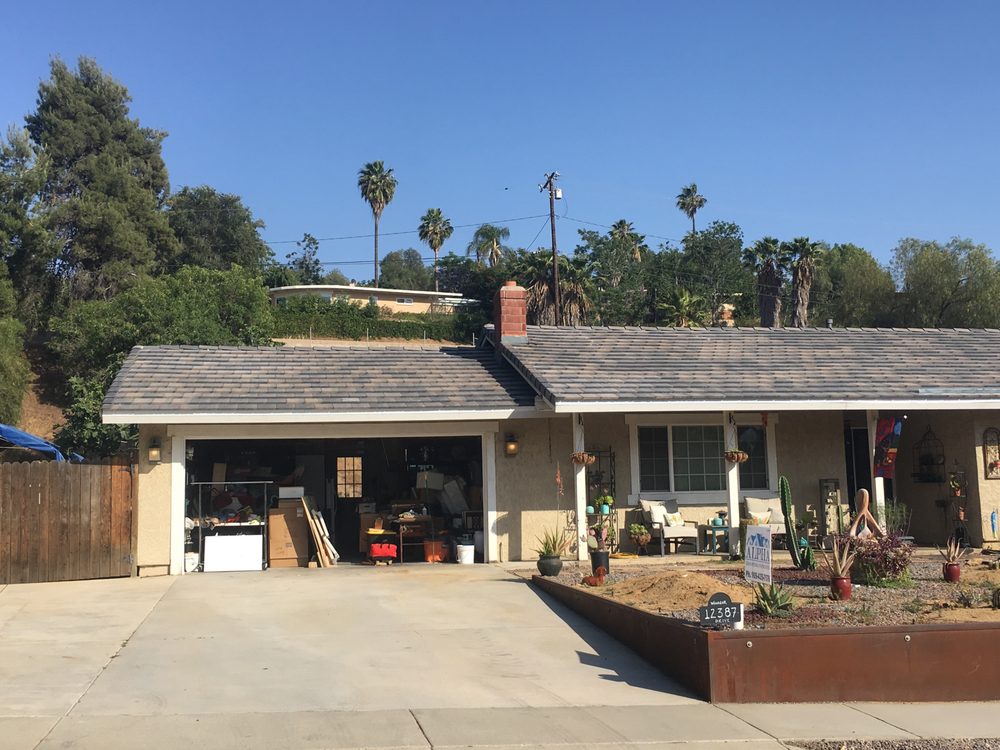 Slide of Alpha Roofing Company