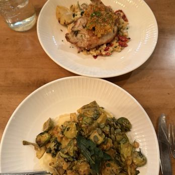 Root & Bone Indianapolis - Ricotta ravioli (bottom) and brick chicken (top) - American Near Me - Indianapolis, Indiana