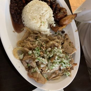 Cafecito - The lechón plate! Not the best picture but it's bomb! - Coffee & Tea Near Me - Chicago, Illinois
