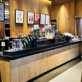 Starbucks - a coffee shop with a counter and chairs - Coffee & Tea Near Me - Glenarden, Maryland