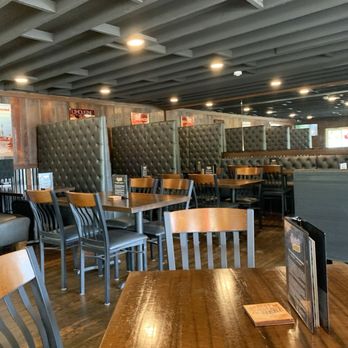 Strip's Chicken - More seating of tables and booths - Breweries Near Me - Lenexa, Kansas Strip's Chicken - More seating of tables and booths - Breweries Near Me - Lenexa, Kansas