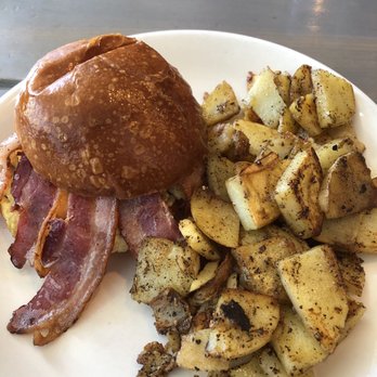 Swift Creek Cafe - 7 Iron Breakfast Sandwich and potatoes - American Near Me - Whitefish, Montana Swift Creek Cafe - 7 Iron Breakfast Sandwich and potatoes - American Near Me - Whitefish, Montana