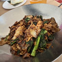 Wide rice noodle, black sauce w chicken .. amazing