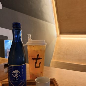 Kyuramen & Tbaar - Fresh Passion Fruit Tea; Sparkling Sake (blue) - Ramen Near Me - Birmingham, Alabama Kyuramen & Tbaar - Fresh Passion Fruit Tea; Sparkling Sake (blue) - Ramen Near Me - Birmingham, Alabama