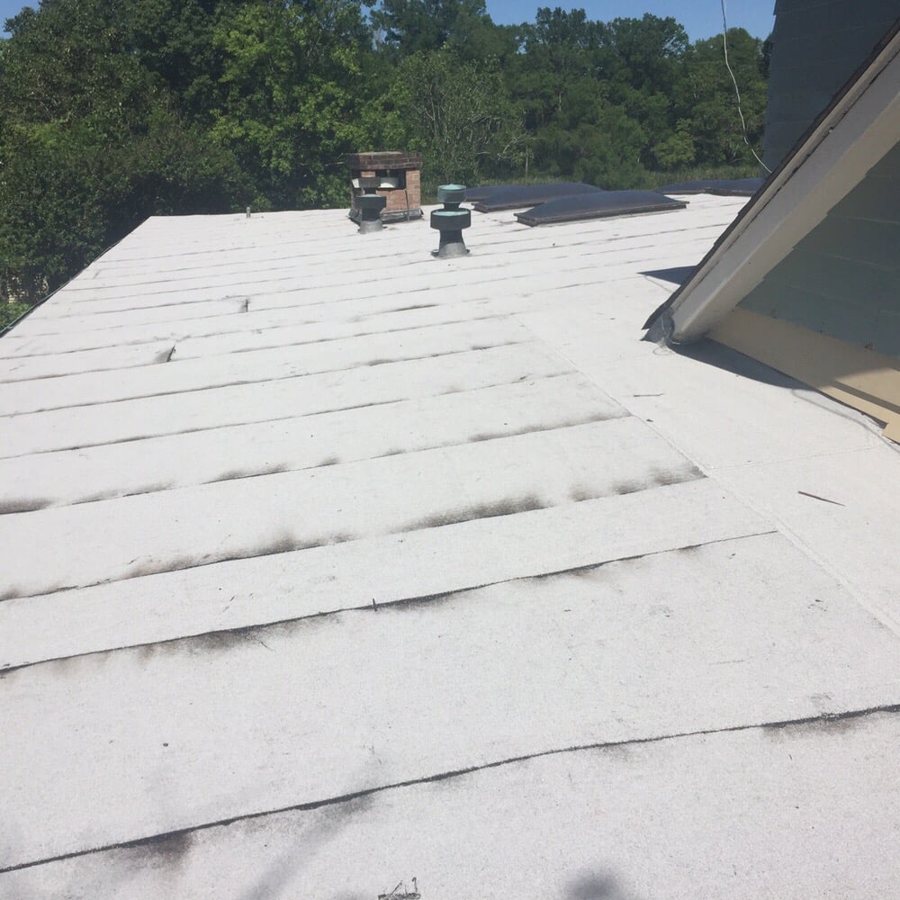 Slide of Ford Roofing Service