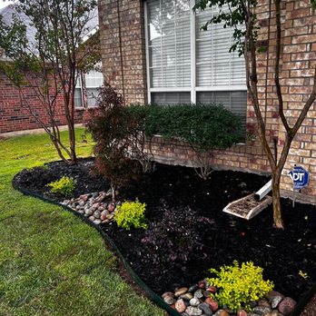 Carlitos Tree Service & More - (After) transforming the flower bed and sod in our clients home - Tree Services Near Me Carlitos Tree Service & More - (After) transforming the flower bed and sod in our clients home - Tree Services Near Me