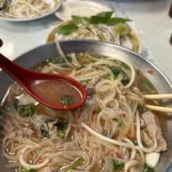 Vietnam Kitchen - B1. Pho Tai : Beef Pho with onions, rice noodles, sliced beef, green onions, mint and cilantro