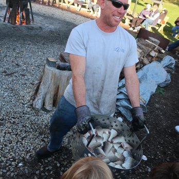 Old Post Office Restaurant - The customary photo op with about 50 whitefish steaks before they enter the cauldron. - Seafood Near Me - Ephraim, Wisconsin