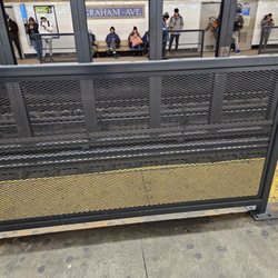 MTA - Graham Ave Subway Station - Protective barrier as safety measures in response from violent incidents