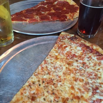 The Post - Giant slices of cheese and pepperoni. - Pizza Near Me - Louisville, Kentucky The Post - Giant slices of cheese and pepperoni. - Pizza Near Me - Louisville, Kentucky
