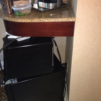 Hilton Providence - Coffee machine, microwave and fridge on floor with one outlet. - Hotels Near Me - Providence, Rhode Island