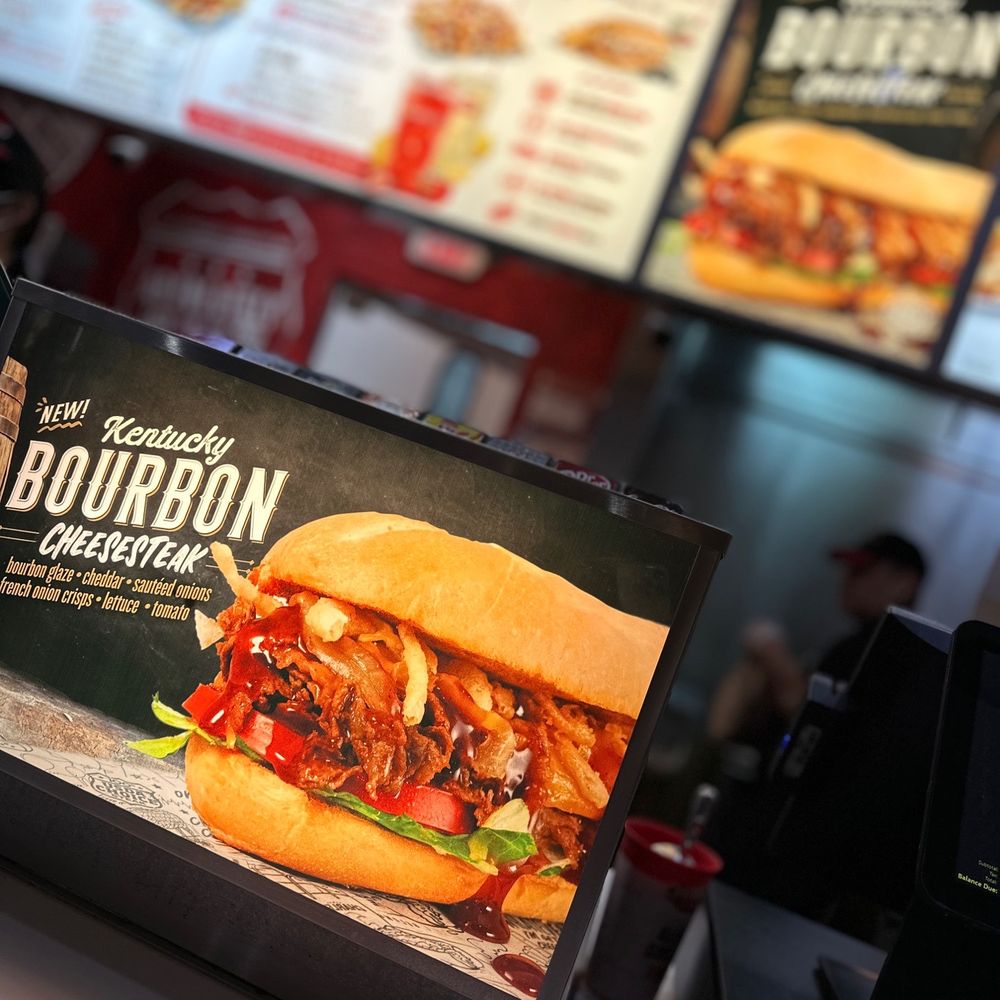 a menu and a sandwich