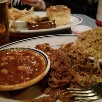 Redbones BBQ - Pulled pork with dirty rice and baked beans. Smoked sausage with cornbread in the back. - Barbeque Near Me - Somerville, Massachusetts Redbones BBQ - Pulled pork with dirty rice and baked beans. Smoked sausage with cornbread in the back. - Barbeque Near Me - Somerville, Massachusetts
