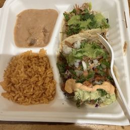 3 Taco Combination Plate with Carnitas Tacos and a Fish Tacos. Rice and Beans are flavorful.
