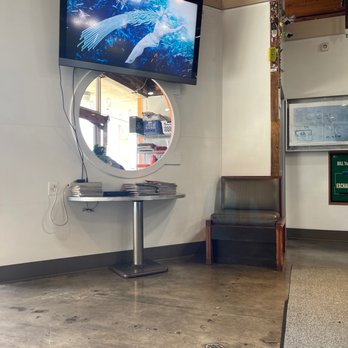 Laundry Garage - Large tV. Keeping us entertained. - Laundromat Near Me - Sacramento, California