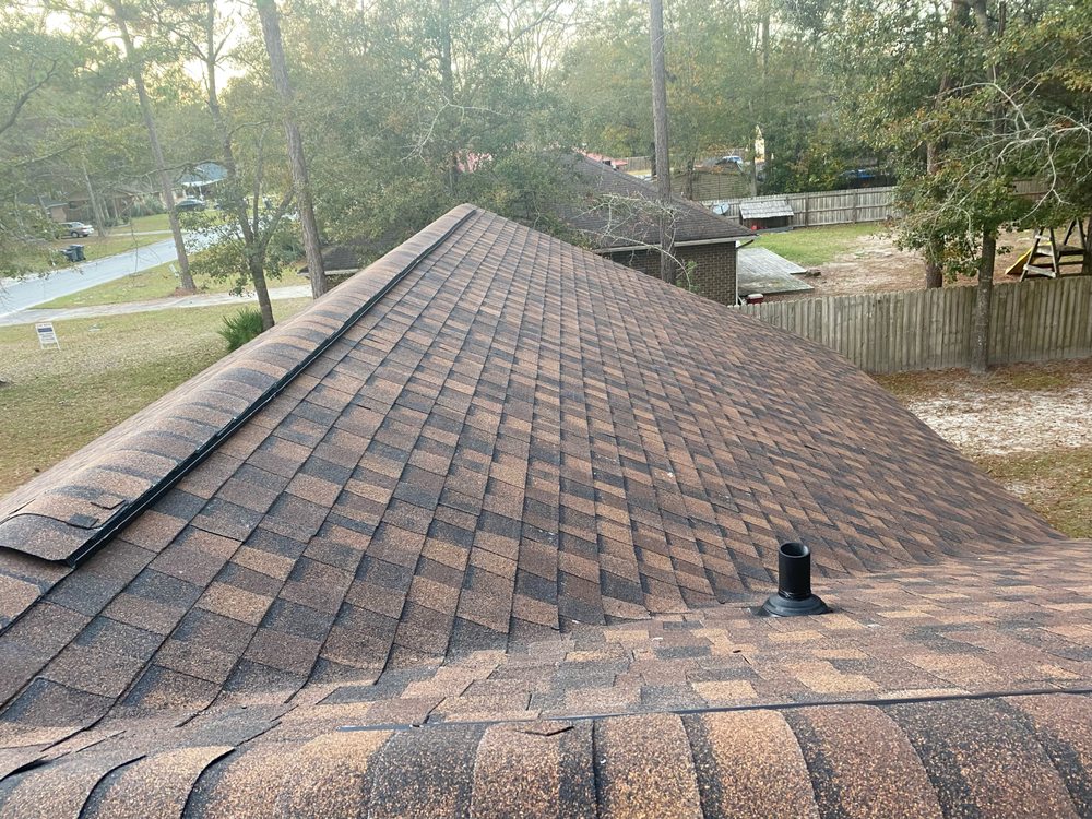 Slide of Precision Roofing