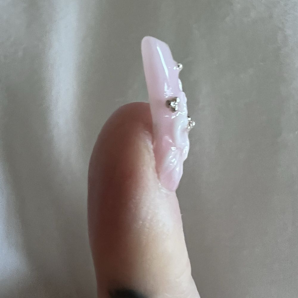 Ivy's Nails & Spa - This is the nail design I received with the silver balls that seems to be what is catching on everything. - Nail Salons Near Me - Temecula, California