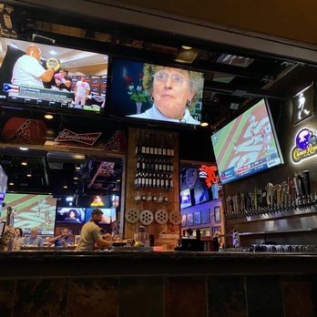 Tailgaters and IL Primo - a man watching televisions - Sports Bars Near Me - Cave Creek, Arizona Tailgaters and IL Primo - a man watching televisions - Sports Bars Near Me - Cave Creek, Arizona