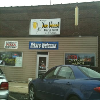 Marcy's One More Bar & Grill - a blue car parked in front of the restaurant - American Near Me - Sheridan, Illinois Marcy's One More Bar & Grill - a blue car parked in front of the restaurant - American Near Me - Sheridan, Illinois