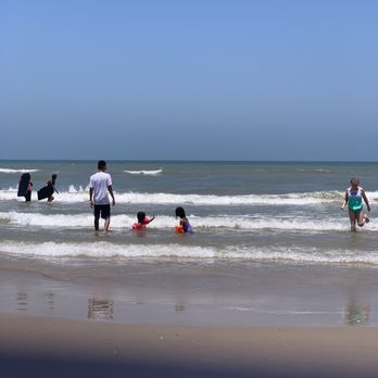 Jim's Pier - My kiddos enjoying the beach and us the Jim's beach service by Zac. - Boat Charters Near Me - South Padre Island, Texas