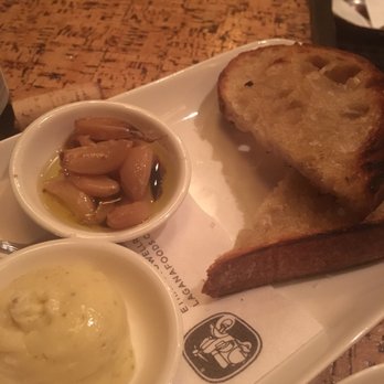 How to Cook a Wolf - The famous crusty bread and butter and roasted garlic. Sorry Tess it's roasted not stewed. My bad. - Italian Near Me - Seattle, Washington How to Cook a Wolf - The famous crusty bread and butter and roasted garlic. Sorry Tess it's roasted not stewed. My bad. - Italian Near Me - Seattle, Washington
