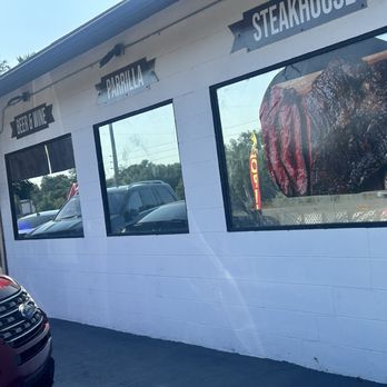 The Equestrian Grill - Don't let the exterior scare you. This is an excellent restaurant run by an Argentinian family. - New American Near Me - Dunnellon, Florida