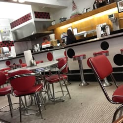 Buchanan Fountain and Grille - Old fashioned bar and table tops