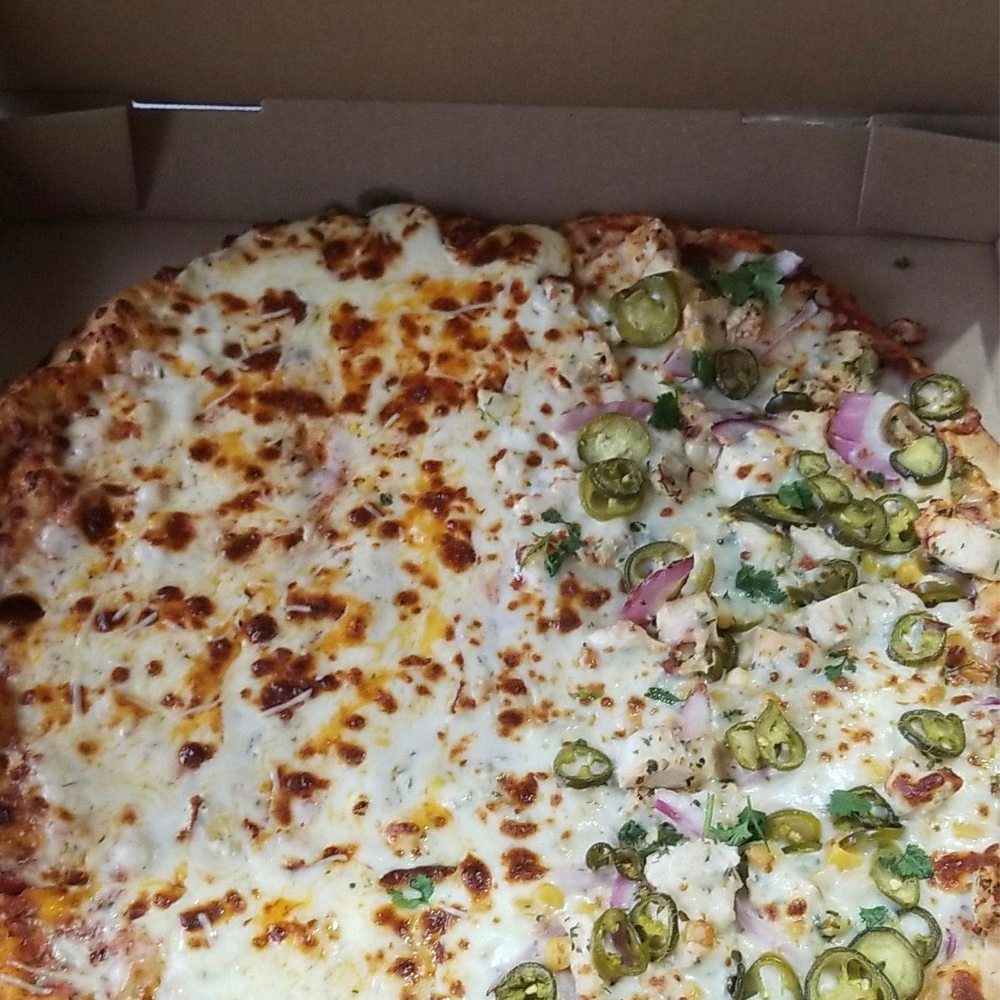 Palio's Pizza Cafe - Half Quattro Formaggio Pizza and half Scorcher Pizza - Italian Near Me - Fort Worth, Texas Palio's Pizza Cafe - Half Quattro Formaggio Pizza and half Scorcher Pizza - Italian Near Me - Fort Worth, Texas