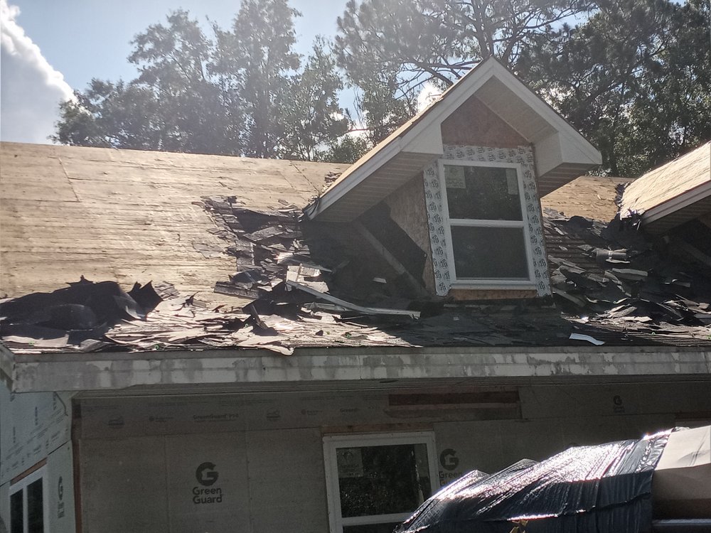 Slide of R and R Roofing Services