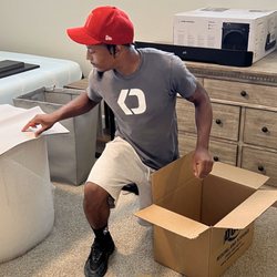 Dose Moving and Storage - Preparing a box for packing.