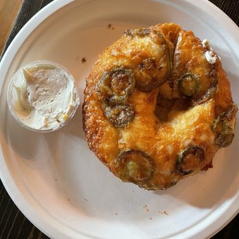 Rachel's Bagels & Burritos - Cheddar Jalapeño Bagel w/ side of Black Truffle Cream Cheese - Bagels Near Me - Seattle, Washington Rachel's Bagels & Burritos - Cheddar Jalapeño Bagel w/ side of Black Truffle Cream Cheese - Bagels Near Me - Seattle, Washington