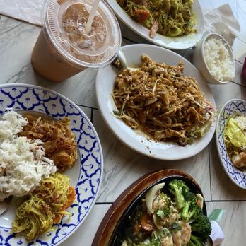 Kamlai Thai Cuisine - N1. Pad Thai, N7. Singapore Noodles, E3. Garlic Delight w shrimp and Thai Tea. It was all delicious! - Thai Near Me - Tacoma, Washington Kamlai Thai Cuisine - N1. Pad Thai, N7. Singapore Noodles, E3. Garlic Delight w shrimp and Thai Tea. It was all delicious! - Thai Near Me - Tacoma, Washington