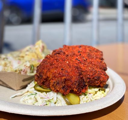 Photo of Wursthall - San Mateo, CA, United States. COVID-19 PATIO DINING: Kenji's Korean Hot Chicken (no bun) w/ chili oil, Korean spice blend, yogurt ranch slaw, pickles, potato salad | $16