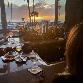 21 Oceanfront - Sunset view while sitting at the bar. - New American Near Me - Newport Beach, California 21 Oceanfront - Sunset view while sitting at the bar. - New American Near Me - Newport Beach, California