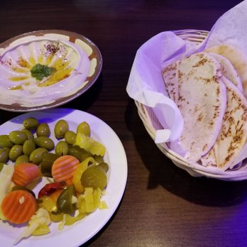 Ali Baba Mediterranean Grill - Hummus served with olive plate - Mediterranean Near Me - Memphis, Tennessee Ali Baba Mediterranean Grill - Hummus served with olive plate - Mediterranean Near Me - Memphis, Tennessee