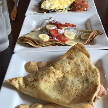 Rooster - Downtown - Delicious! Roasted Ham Savory Crepe Nutella Crepe with banana and strawberries  Seasoned black bean, cheddar, spinach, red onion & salsa - Creperies Near Me - St. Louis, Missouri