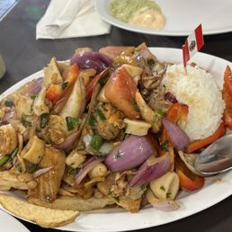 Saltado De Mariscos / 19. Seafood Sauteed with Onions Saltado De Mariscos / 19. Seafood Sauteed with Onions