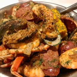 Cajun seafood combo with shrimp, crab and mussels Cajun seafood combo with shrimp, crab and mussels