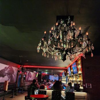 The Hound Bar - a chandelier hanging from the ceiling - Bars Near Me - South Gate, California The Hound Bar - a chandelier hanging from the ceiling - Bars Near Me - South Gate, California